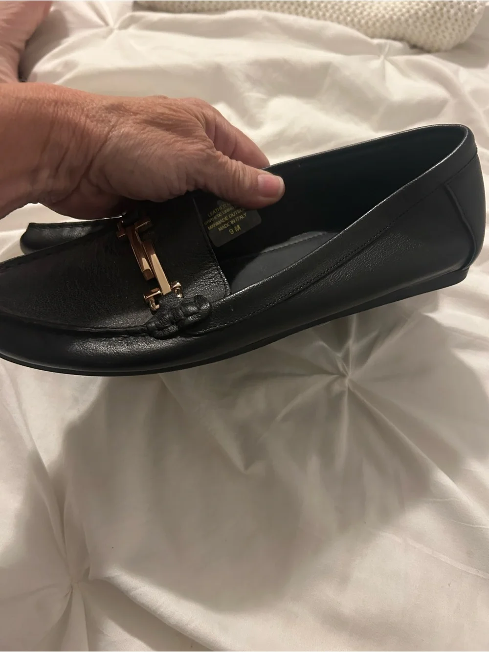 Coach and Four Black Leather Slip-On Loafers with Gold Logo